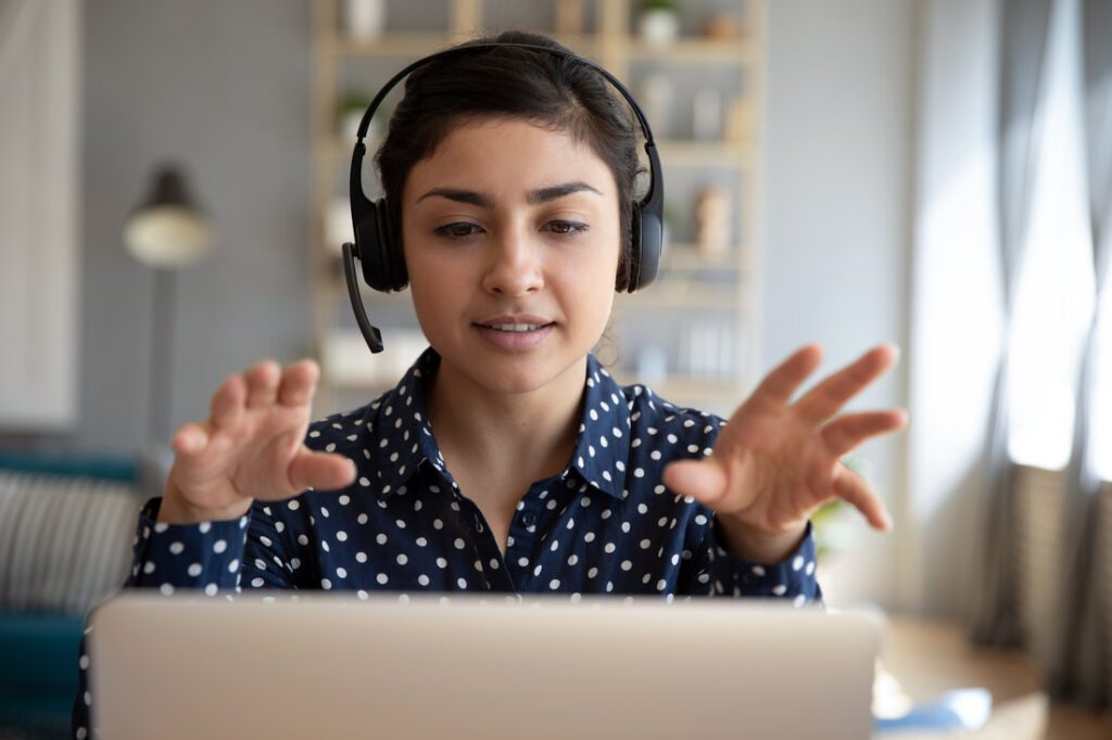 Picture of female presenting virtually.