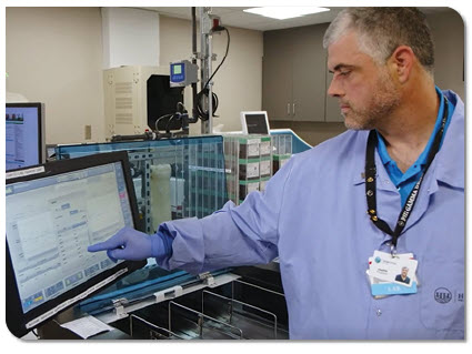 Man using laboratory analyzer